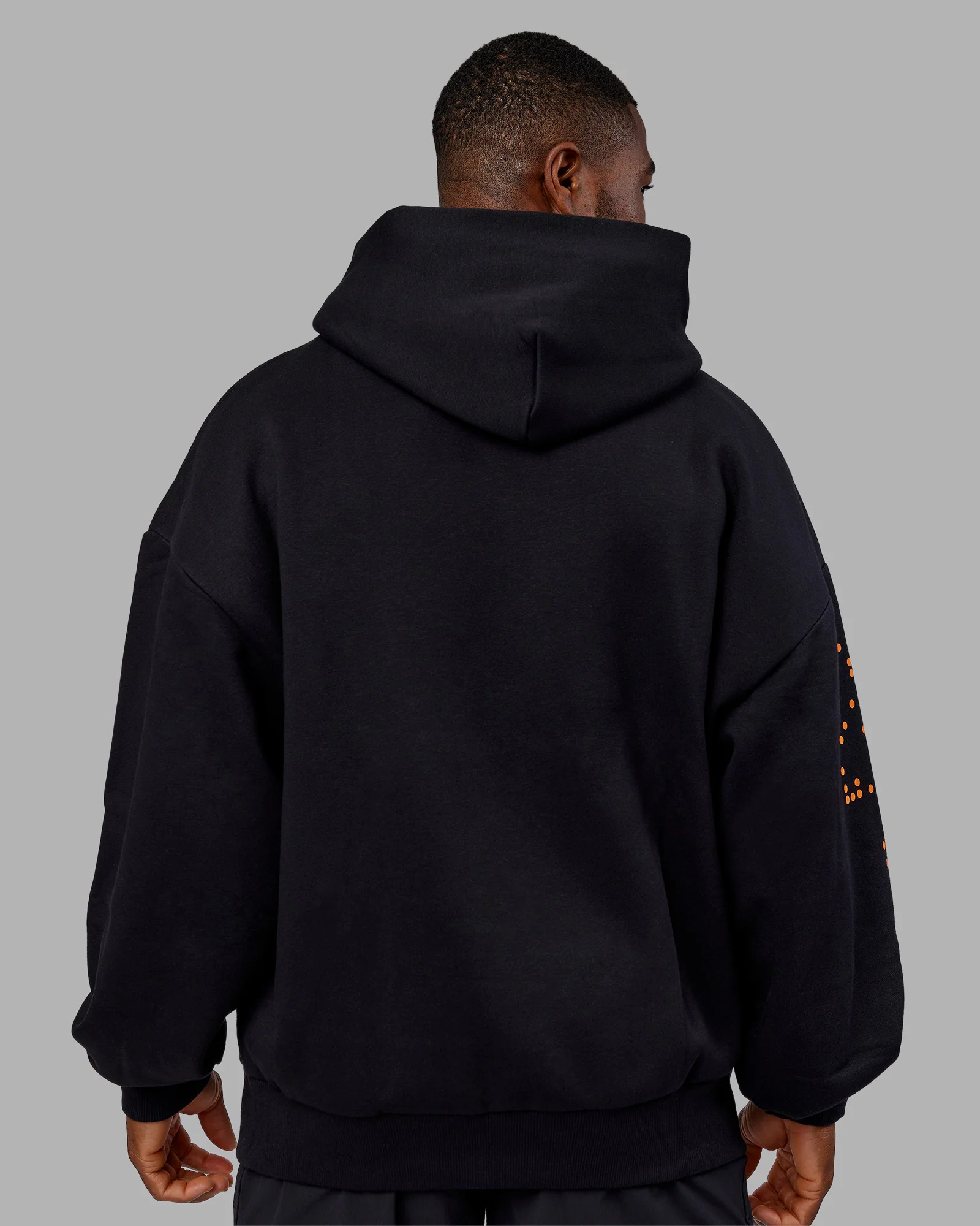 Hyped Unisex Oversized Hoodie - Black-Vibrant Orange - Image 4